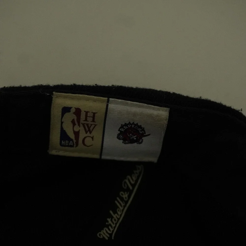 Mitchell & Ness Toronto Raptors Snapback Hat Black Purple HWC Logo